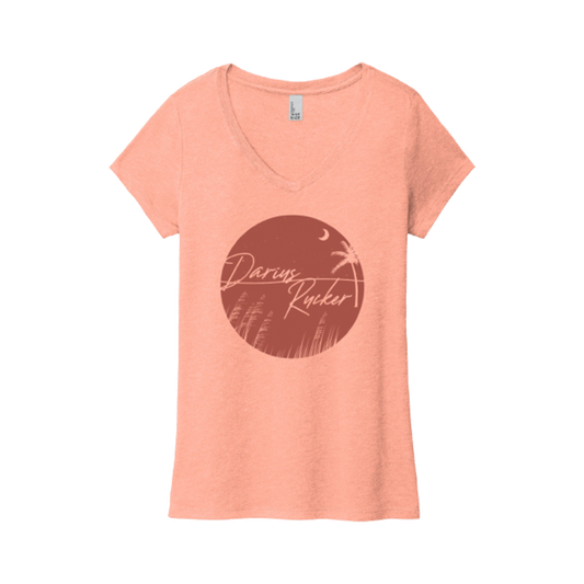 Circle pal tree logo on a desert pink v-neck ladies tee Darius Rucker